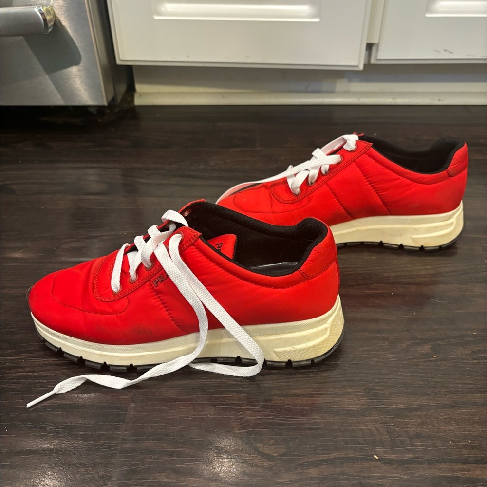 Prada red canvas sneakers size 38.